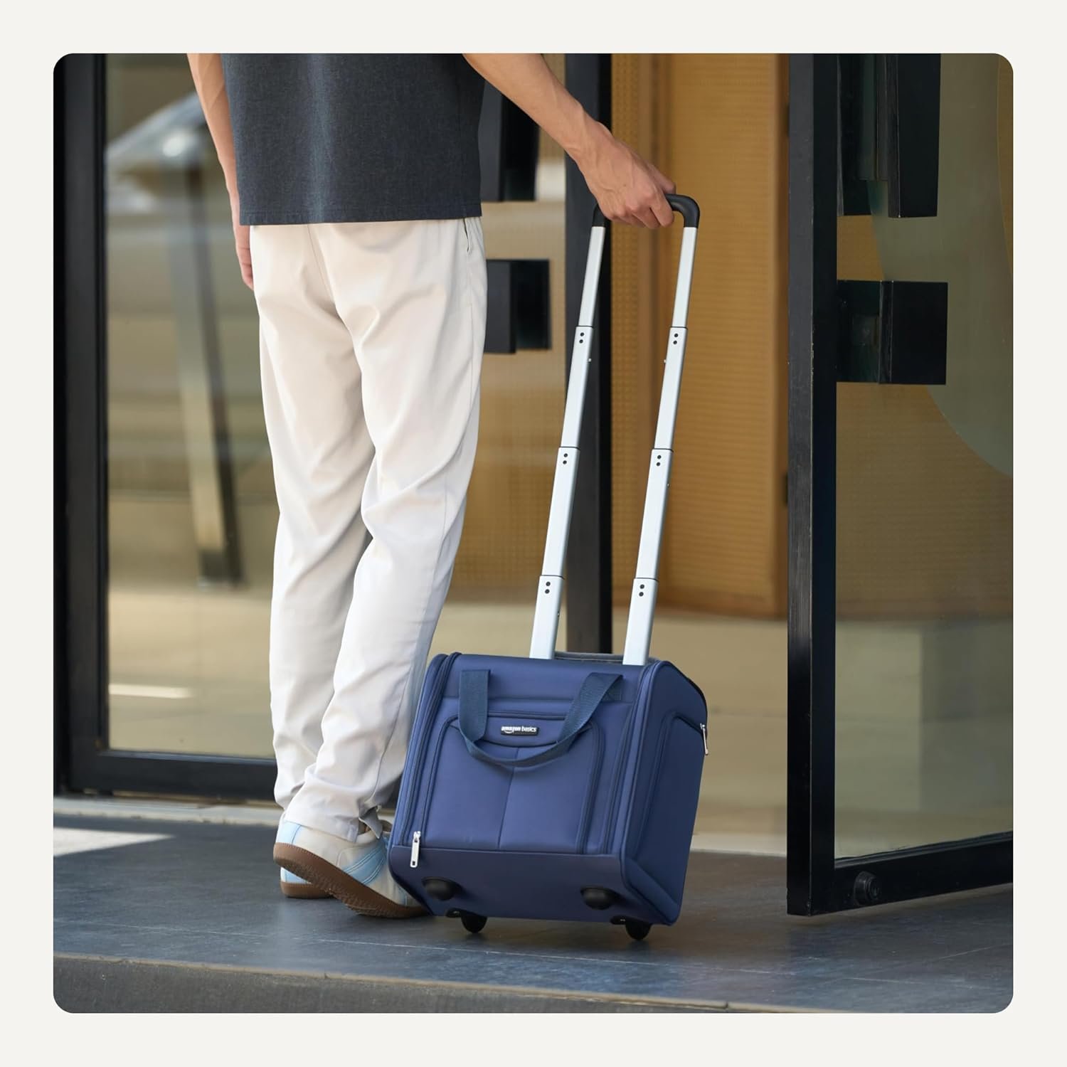 1777438373 Amazon Basics Underseat Carry On Luggage with Wheels and Handle 14 Rolling Travel Bag Fits Overhead Bins Organized Compartments Navy.jpg